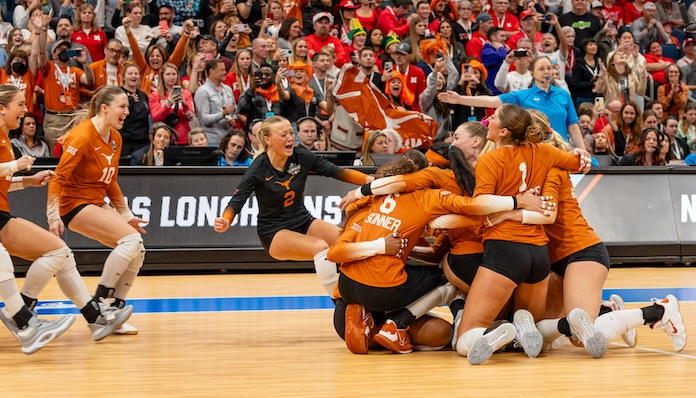 Nebraska volleyball match point celebration and college volleyball crowd