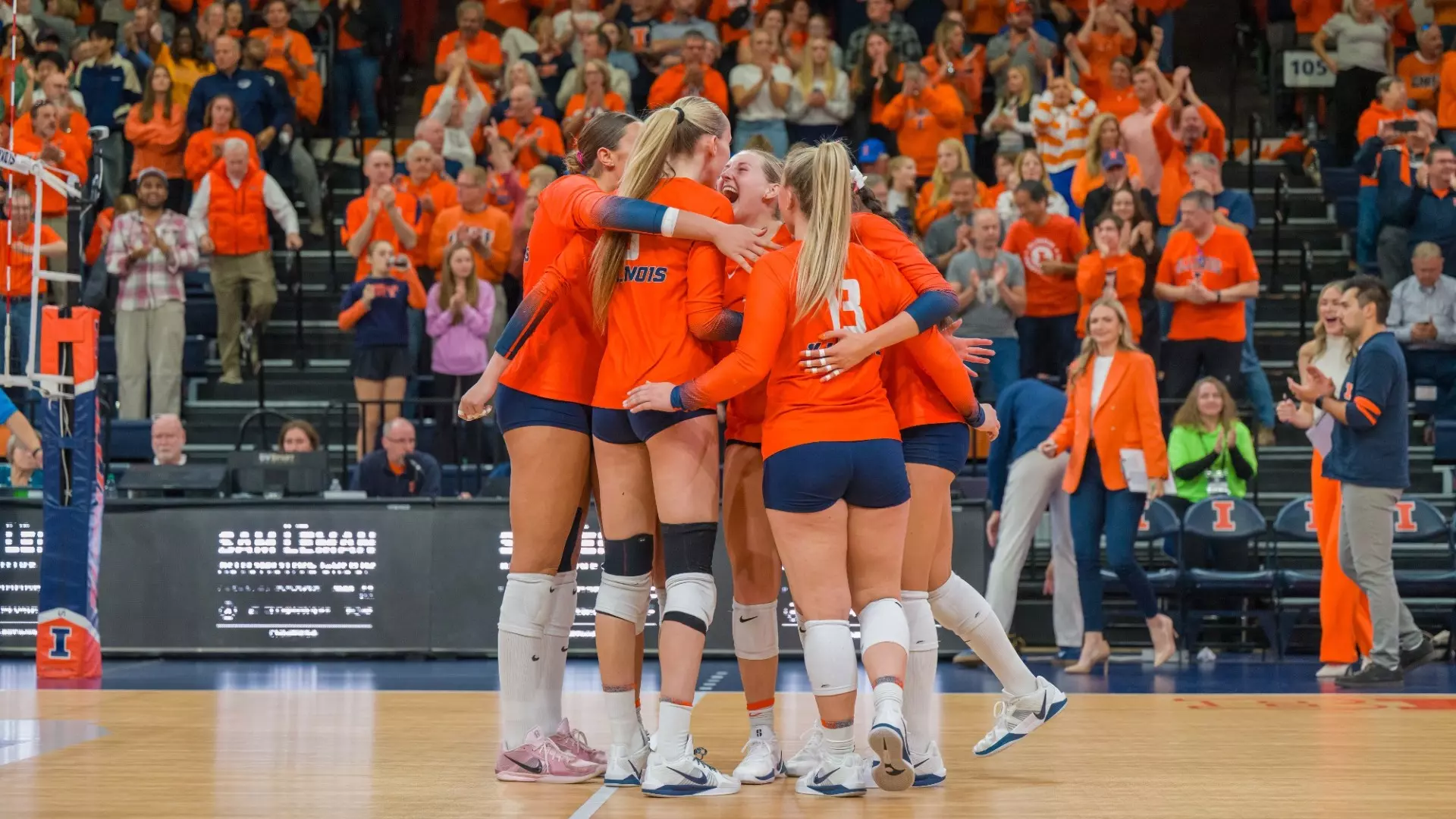 College volleyball match action